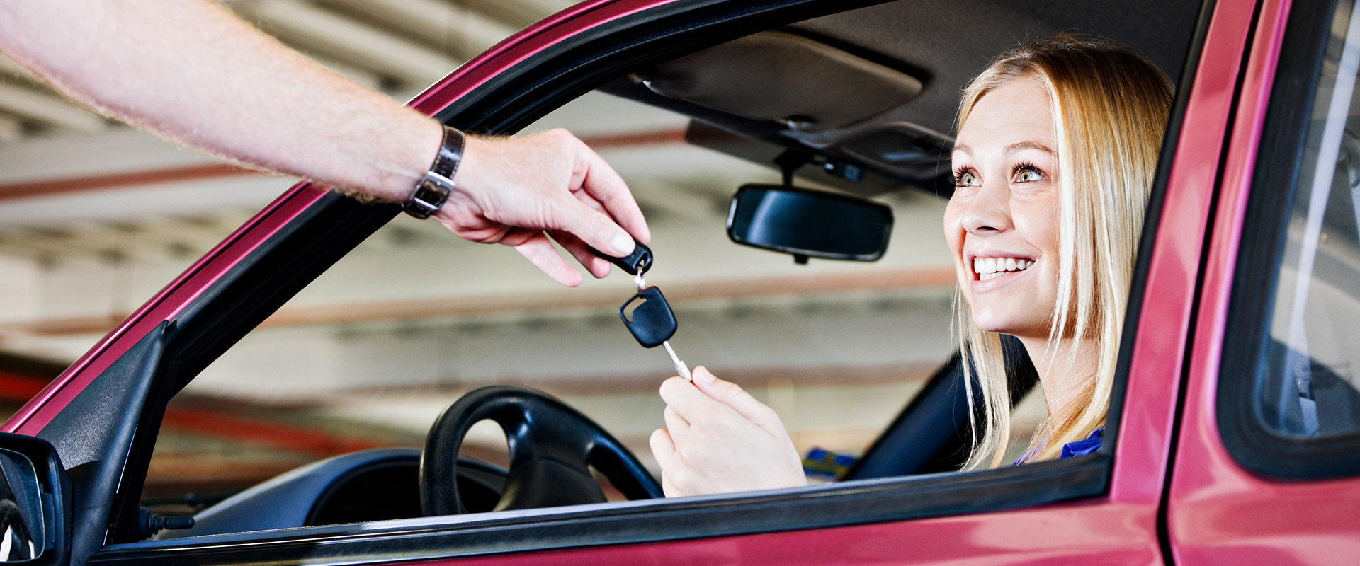 auto insurance policy holder smiling