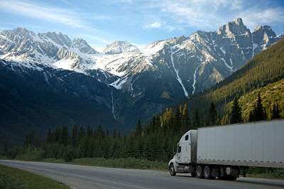 A truck driving on a freeway.